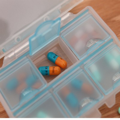 Portable Plastic double layer pill box with 7 compartments inside