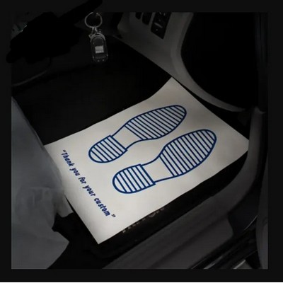 Disposable White Car Mats w/Striped Shoe